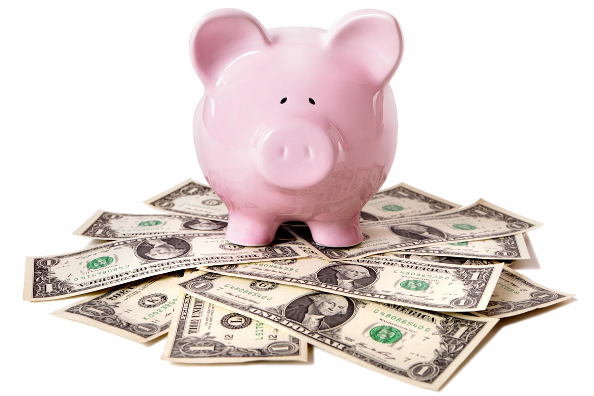 Piggy bank with dollars